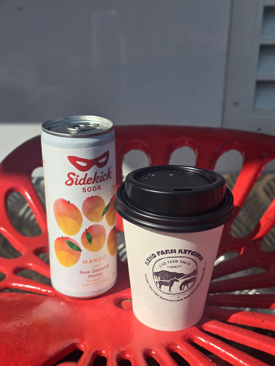 Sidekick Mango with coffee at Kind Farm Cardrona